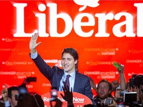 Newly elected Prime Minister of Canada Justin Trudeau waves supporters as he arrives to make his speech at the Liberal Party election night headquarters in Montreal on Tuesday, October 20, 2015.