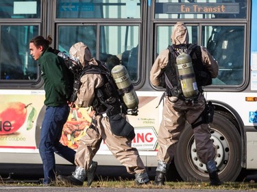 Sn actor playing a suspect is apprehended by Montreal police during a terrorism attack simulation at the CFB Montreal (Longue-Pointe) military base in Montreal on Saturday, Oct. 24, 2015.