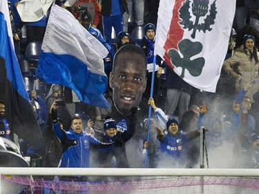 Montreal Impact cheer their team against Toronto FC in the second half of the final game of the M.L.S. season for the Impact at Saputo stadium in Montreal Sunday, October 25, 2015.