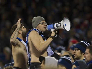 Montreal Impact fans try to drum up excitement during an Impact game against Toronto FC in the second half of the final game of the M.L.S. season for the Impact at Saputo stadium in Montreal Sunday, October 25, 2015.