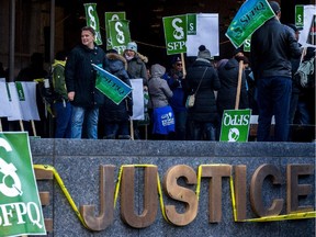 Civil servants picketed in Montreal Oct. 27, 2015, at the Palais de Justice.