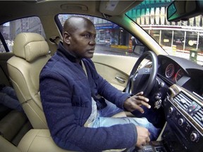 Joel DeBellefeuille in his BMW in Montreal Wednesday, October 28, 2015. DeBellefeuille says he has been racially profiled by police on the South Shore 3 times, the most recent time last Friday.