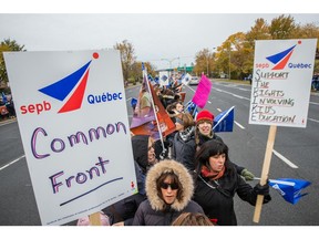 On Wednesday, teachers and support staff from the Riverside School Board protest in St-Lambert against government cuts as part of province-wide rolling protests.