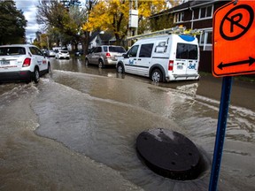 More than 100 residential buildings in Montreal were flooded, on Friday, October 30, 2015, after a water-main burst on Pie-X Blvd. at Everett St. One of the worst affected streets was 22nd Avenue.