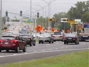 Traffic moves along Highway 20 eastbound in Île-Perrot towards the Galipeault Bridge.