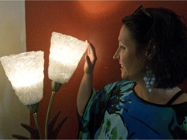 Stephanie Carrière with a lamp she bought at a flea market.  (Phil Carpenter / MONTREAL GAZETTE)