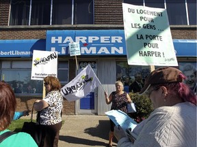 Housing activists FRAPRU demonstrate outside Robert Libman's riding office in Montreal on Thursday, September 24, 2015.