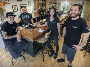 Partners Pablo Rojas, from left, Tina An and Hakim Rahal with commis Rafael Morales (behind the bar) at Provisions on Van Horne Ave.