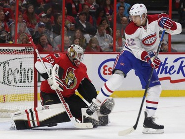 The Ottawa Senators took part in their home opener against the Montreal Canadiens at Canadian Tire Centre in Ottawa Ontario Sunday Oct 11, 2015. Ottawa Senators goalie Matthew O'Connor watches Montreal Canadiens Dale Weise tip the puck during second period action Sunday, Oct. 11, 2015.