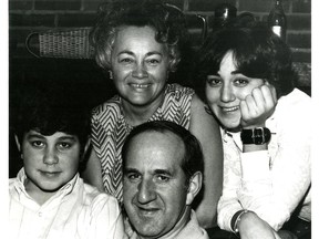 Archival photo: Pierre Laporte, at home with his son (Jean); wife, Françoise, and their daughter (Claire).