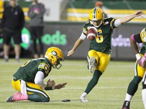 Edmonton Eskimos' Sean Whyte kicks a field goal against the B.C. Lions during overtime action in Edmonton on Saturday, Oct. 17, 2015.