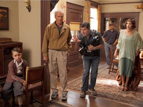Stephen Campanelli on the set of Changeling (2008) with director Clint Eastwood and actor Angelina Jolie. Campanelli started working for Eastwood after earning a film degree from Concordia University in 1983.