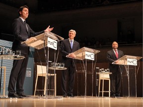 Liberal Leader Justin Trudeau, left to right, Conservative Leader Stephen Harper and NDP Leader Tom Mulcair participate in the Munk Debate on Canada's foreign policy in Toronto, on Monday, Sept. 28, 2015. The debate was the best organized and most informative of the five staged during this election, and chances are most voters didn't watch a minute of it.