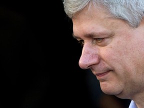 Conservative Leader Stephen Harper leaves a polling station after casting his ballot in the federal election in Calgary, Alta., on Monday, October 19, 2015.