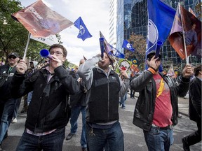 Teachers were among the thousands of protestors from a coalition of public-sector unions who marched in Montreal Oct. 21, 2015.