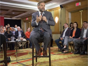 NDP leader Tom Mulcair speaks to supporters a town hall meeting Thursday, October 8, 2015 in Toronto.