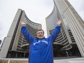 Toronto mayor John Tory poses at the Podium Green Roof at City Hall in Toronto, Ont.  on Tuesday October 6, 2015. This was after a flag raising ceremony to kick of the Toronto Blue Jays 2015 playoff action.