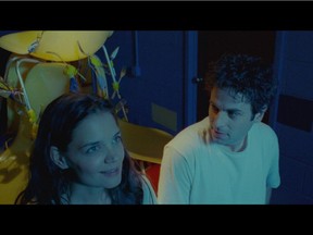 In Touched With Fire, Katie Holmes and Luke Kirby are totally convincing and moving as the pair whose romance hits both passionate highs and lows and confounds their respective parents and the mental-health pros.