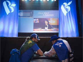Two Bloc Québécois supporters watch election results at the party's election headquarters Monday, October 19, 2015 in Montreal.