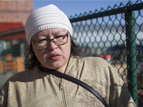 Cindy Wabanonik, an Algonquin who lives in Val d'Or, in the city north of Montreal Tuesday, October 27, 2015. She says "Today is the first time I started walking around town since the report aired and you can feel something heavy in the air."