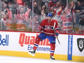 Alex Galchenyuk celebrates one of his two goals scored in the Canadiens' 3-2 overtime loss to the New Jersey Devils at the Bell Centre on Nov. 28, 2015.