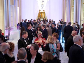 Guests mingle during pre-dinner cocktails at a fundraiser for Château Ramezay