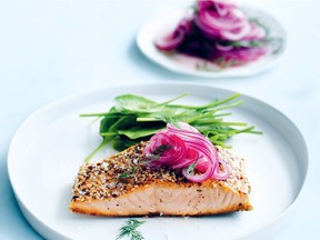 A topping of quickly pickled red onions accents crisply cooked salmon fillets.