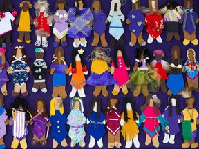 A wall of Faceless Dolls leans against the stafe at Zwick's Park pavilion as part of the Sisters of the Sisters in Spirit Vigil for Missing and Murdered Aboriginal Women on Sunday October 4, 2015 in Belleville, Ont. The Faceless Doll Project is an art project which uses faceless female dolls to represent the missing women.