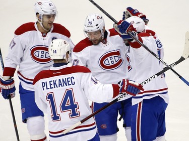 Andrei Markov celebrates his goal with teammates during the first period in Pittsburgh on Wednesday night.