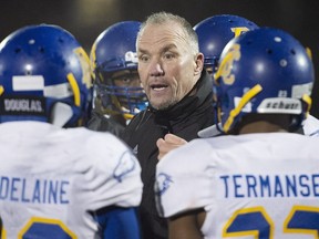 UBC Thunderbirds head coach Blake Nill talks to his players as they defeat the St. Francis Xavier X-Men 36-9 to win the Uteck Bowl in Antigonish, N.S., on Saturday, Nov. 21, 2015. UBC will face the Montreal Carabins for the Vanier Cup.