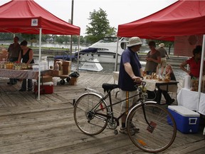 Boats, bikes, boardwalks and booths at the county market along Ste-Anne's boardwalk.