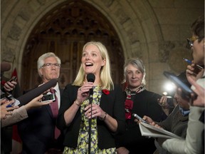 Minister of Environment and Climate Change Catherine McKenna speaks to reporters after her swearing-in, in Ottawa, on November 4, 2015.