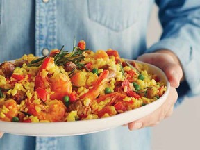 Rice and vegetables are added to shrimp and sausages to make an easy meal – it's even easier if you prepare it in advance.