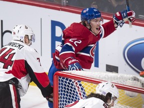 Montreal Canadiens' Dale Weise, right, celebrates his power play goal against the Ottawa Senators during second period NHL hockey action, in Montreal, on Tuesday, Nov. 3, 2015.