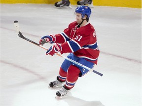 Montreal Canadiens centre David Desharnais (51) celebrates after scoring the winning goal during the overtime period against the Vancouver Canucks in National Hockey League action Monday, November 16, 2015 in Montreal.