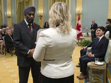 Harjit Sajjan is sworn in as defence minister at Rideau Hall in Ottawa on Wednesday, November 4, 2015. Prime Minister Justin Trudeau is at right.