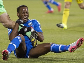 Montreal Impact’s Didier Drogba was booked for hanging on to Columbus Crew goalkeeper Steve Clark’s leg after a challenge during MLS playoff in Montreal on Nov. 1, 2015. The incident that has taken on a life of its own on social media.