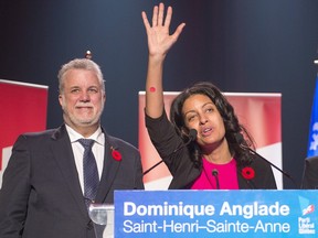 Dominique Anglade celebrates with Quebec Premier Philippe Couillard after winning the by-election in the Saint Henri-Saint Anne riding on Monday.