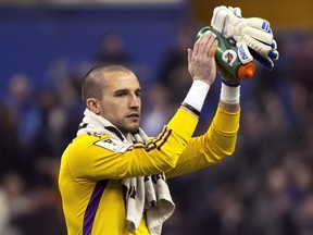 Montreal Impact goalkeeper Evan Bush celebrates his team's 2-0 victory over LD Alajuelense during CONCACAF soccer semi-final action Wednesday, March 18, 2015 in Montreal.