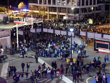 Football fans leave the Stade de France stadium following the friendly football match between France and Germany in Saint-Denis, north of Paris, on November 13, 2015, after a series of gun attacks occurred across Paris as well as explosions outside the national stadium where France was hosting Germany. At least 18 people were killed, with at least 15 people killed at the Bataclan concert hall in central Paris, only around 200 metres from the former offices of Charlie Hebdo which were attacked by jihadists in January.