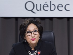 Justice France Charbonneau delivers her remarks as she sits on the closing day in Montreal on Nov. 14, 2014, of the Charbonneau Commission, a Quebec inquiry looking into allegations of corruption in the province's construction industry.
