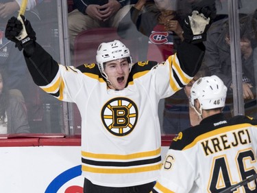 Boston Bruins' Frank Vatrano (72) celebrates his goal against the Montreal Canadiens with teammate David Krejci (46) during second period NHL hockey action, in Montreal, on Saturday, Nov. 7, 2015.