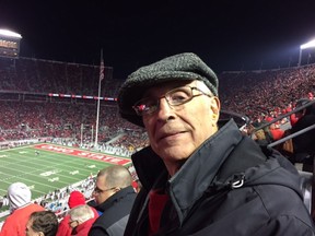 Gunner Riley, age 74, in his seat at Ohio Stadium for game between Ohio State and University of Minnesota in Columbus, Ohio on Nov. 7, 2015. Riley, who graduated from Ohio State and also taught architecture there, has been going to Buckeyes games since he was 6 years old. Photo credit: John Sullivan