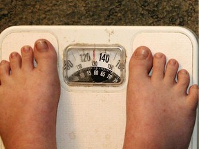 A child stands on a scale on July 16, 2012 in Anniston, Ala.