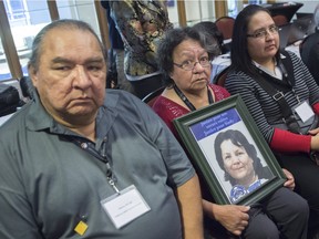 Johnny Wylde and Emilie Ruperthouse-Wylde, parents of Sindy Ruperthouse, a missing Algonquin woman, sit in a meeting between native leaders and Quebec Premier Philippe Couillard Wednesday, November 4, 2015 in Montreal.