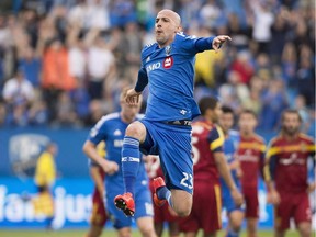 Montreal Impact's Laurent Ciman celebrates after scoring against Real Salt Lake during first half MLS soccer action in Montreal, Saturday, May 16, 2015.