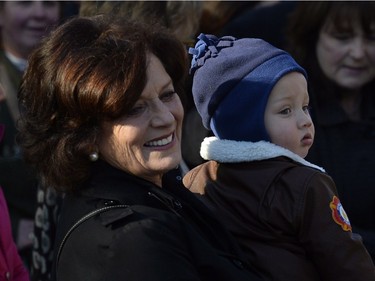 Margaret Trudeau and her grandson Hadrien stand oputside Rideau Hall waiting for the swearing-in of her son Prime Minister-designate Justin Trudeau in Ottawa on Wednesday, Nov. 4, 2015.