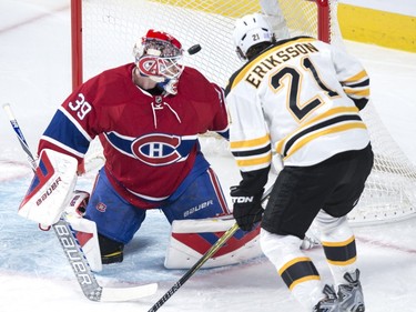 Boston Bruins' Loui Eriksson (21) scores a power play goal on Montreal Canadiens' goalie Mike Condon during first period NHL hockey action, in Montreal, on Saturday, Nov. 7, 2015.