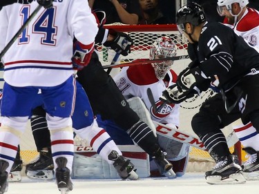 Carey Price #31 of the Montreal Canadiens searches for the puck during the first period against the New York Islanders at the Barclays Center on November 20, 2015, in Brooklyn.