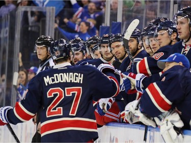 Ryan McDonagh #27 of the New York Rangers celebrates his power-play goal at 17:42 of the second period against the Montreal Canadiens at Madison Square Garden on November 25, 2015 in New York City.